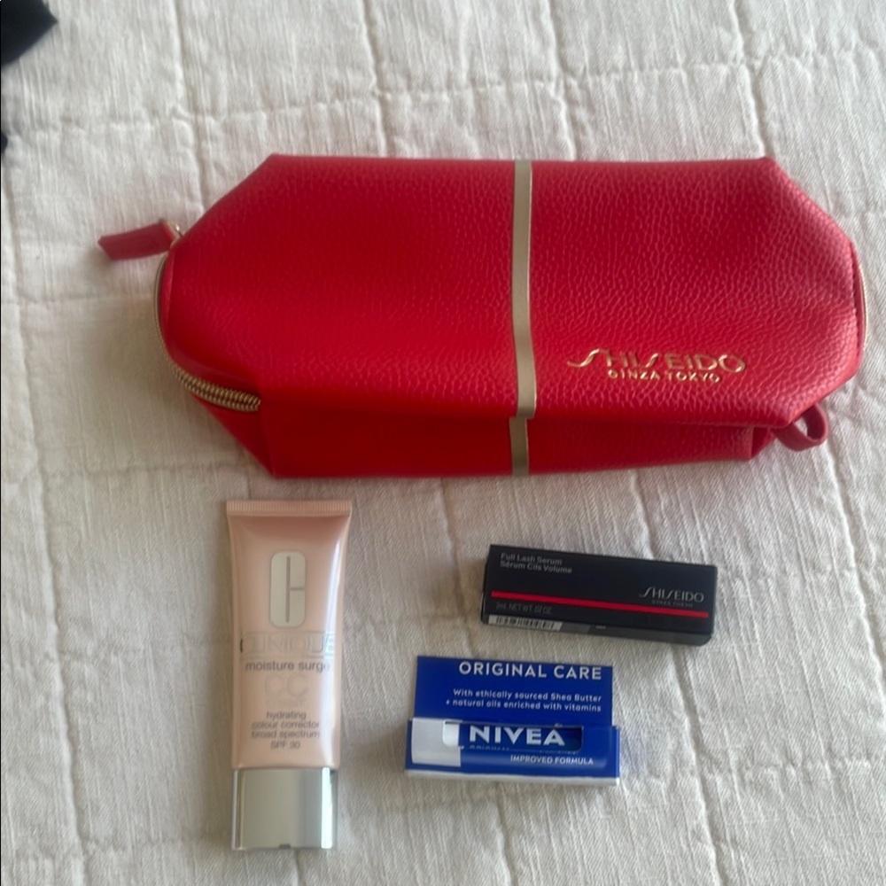 Shiseido Red Makeup Bag with Clinique Moisture Surge